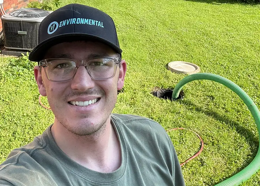 V1 Environmental company owner posing by septic pump, pumping system for residential home - in Southern Illinois